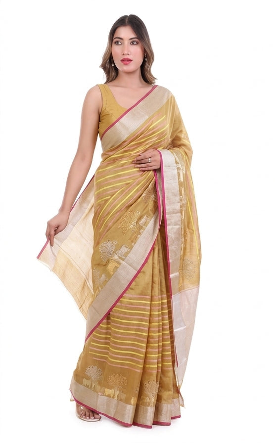 Woman wearing a yellow saree with a white blouse, displayed against a plain background.