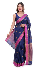 Woman wearing a blue saree with pink border on a white background
