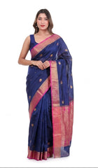 Woman wearing a blue saree with pink border on a white background